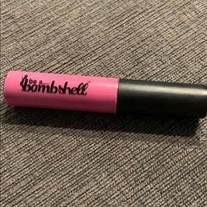 Be a Bombshell pink lip gloss. NEVER USED
